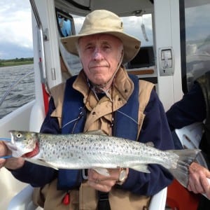 Dr.-Danny-Delargy-shows-a-fine-sea-trout-on Pegasus