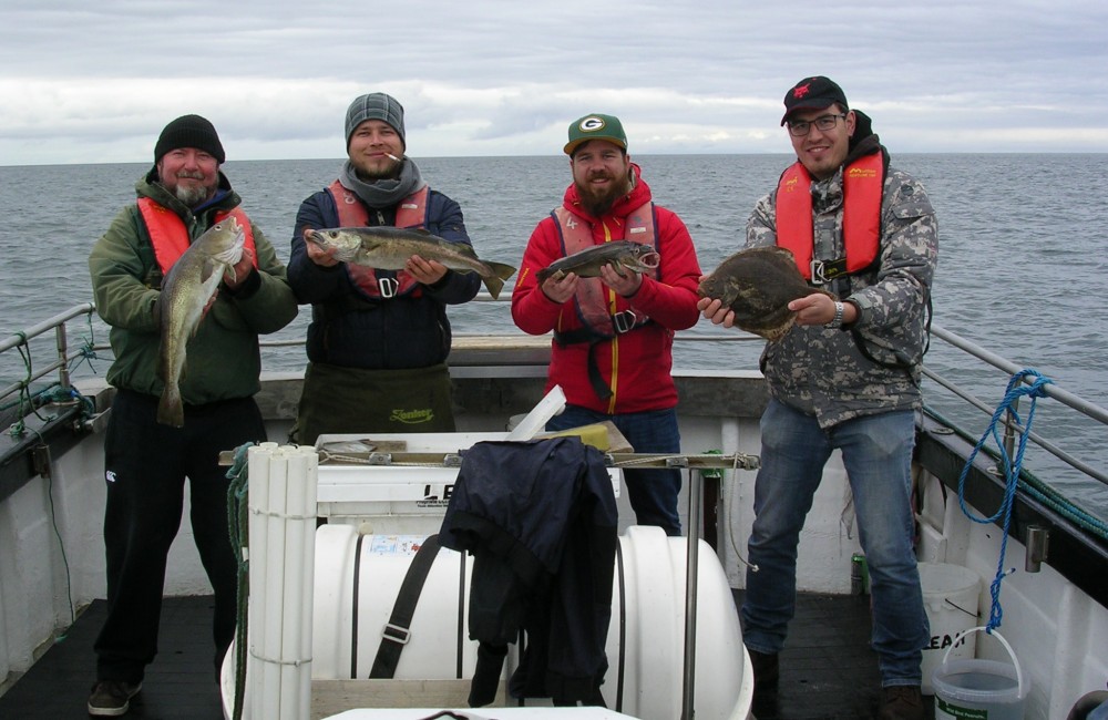 Four happy German anglers on-board “Leah” with their catch from Killala Bay