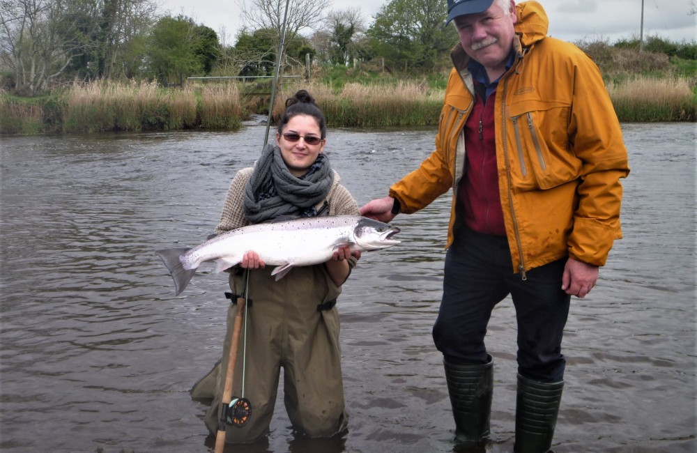 Sophie Berthommier with her fly caught Moy salmon alongside guide Paddy McDonnell